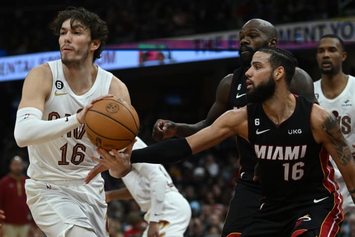 Nov 20, 2022; Cleveland, Ohio, USA; Cleveland Cavaliers forward Cedi Osman (16) looks to pass as Miami Heat forward Caleb Martin (16) defends during the second half at Rocket Mortgage FieldHouse. Mandatory Credit: Ken Blaze-USA TODAY Sports